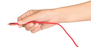 hand holding Red USB cable for smartphone isolated on white back