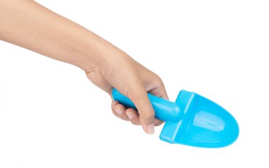 Hand holding Toy plastic blue of shovel isolated on a white back