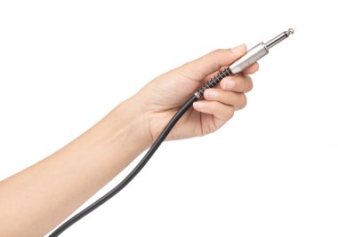 hand holding Audio jack connection of microphone isolated on whi