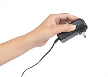 El ele tutuşan Black Power ac 'ten DC adaptörüne.