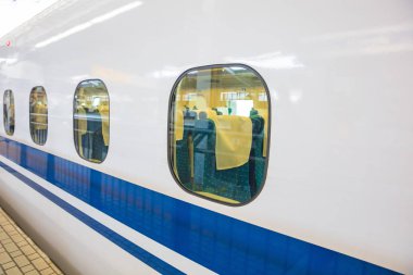 subway car window of the modern and fast commuter train.