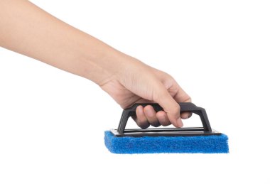 hand holding sponge with plastic handle isolated on white backgr