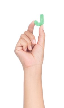 hand holding alphabet made from EVA foam isolated on white backg