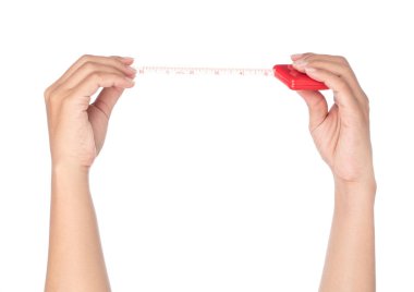 hand holding Measuring tape of the tailor for design isolated on