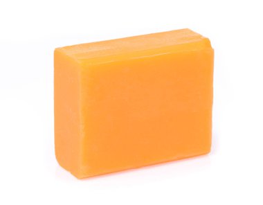 Natural handmade orange soap with herbs  isolated on white backg