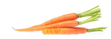 Fresh baby carrot and cut pieces isolated on white background