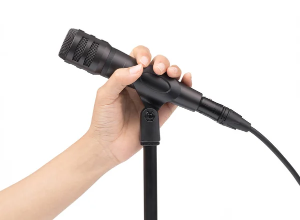 Ruční držení mikrofon izolovaný na bílém pozadí — Stock fotografie