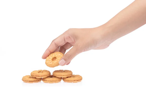 Mão segurando Biscoitos sanduíche, preenchido com geléia isolada no whit — Fotografia de Stock