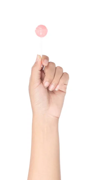 Χέρι κρατώντας γλειφιτζούρι καραμέλα απομονώνονται σε λευκό φόντο — Φωτογραφία Αρχείου