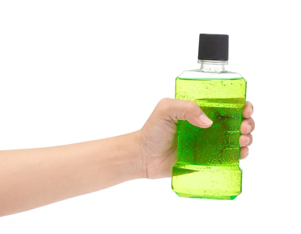 Kézfogás szájvíz műanyag palackban elszigetelt fehér háton — Stock Fotó