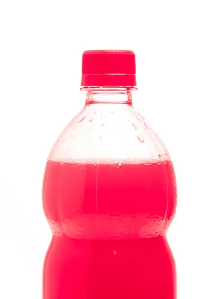 A bottle with tasty drink isolated on background — 스톡 사진