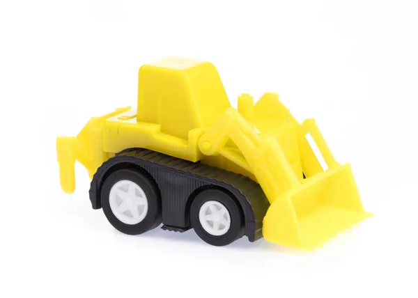 The toy tractor isolated on a white background. — Stock Photo, Image