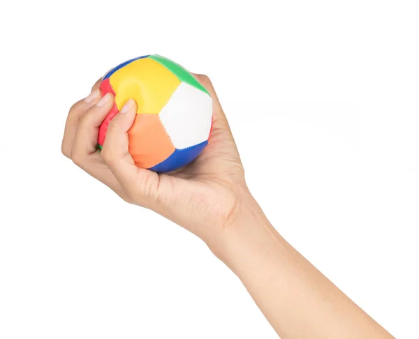 Mão segurando bola brinquedo isolado no fundo branco — Fotografia de Stock