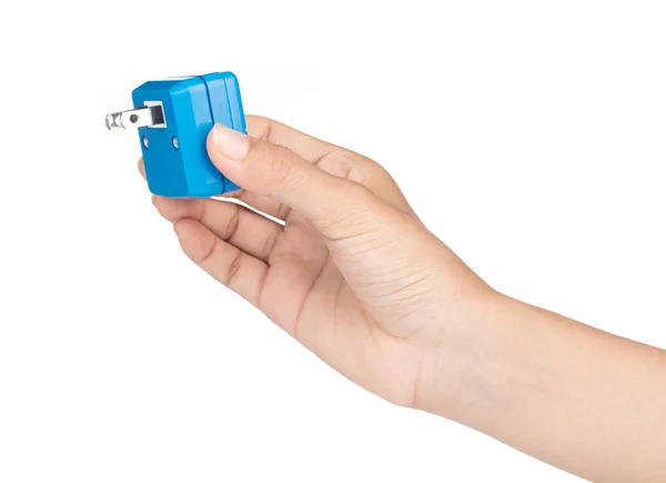 Hand holding Electric energy adapter used to split socket outlet — Stok fotoğraf