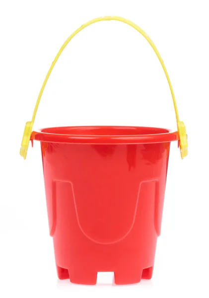 Red toy small bucket isolated on white background — ストック写真