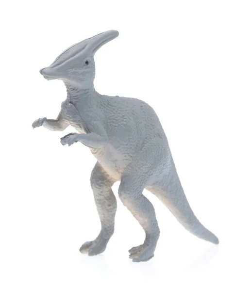 Brinquedo pequeno dinossauro isolado no fundo branco — Fotografia de Stock