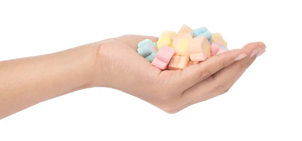 Hand holding sweet marshmallow in the shape of flower isolated o — Stock Photo, Image