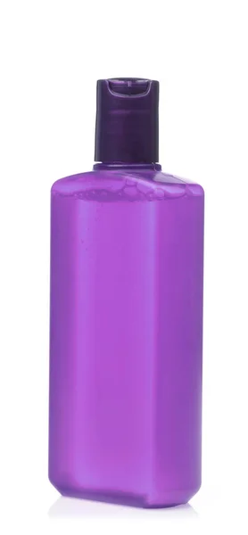 A purple bottle product cosmetic skincare isolated on white back — Stockfoto
