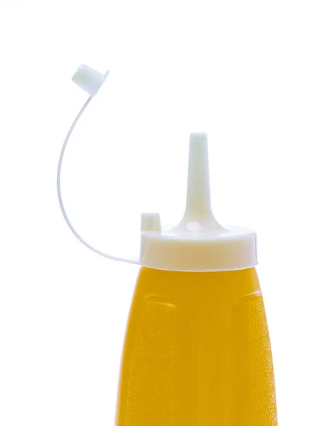 Mostarda garrafa isolada no fundo branco — Fotografia de Stock