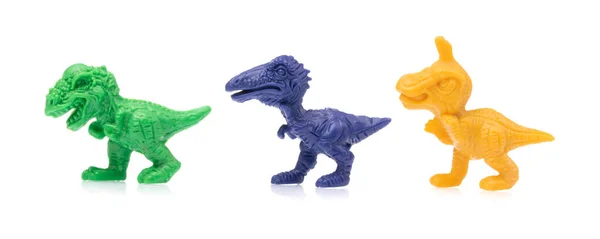 Verzameling van dinosaurus speelgoed geïsoleerd op witte achtergrond — Stockfoto
