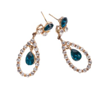 emerald of earrings inlaid with gemstones isolated on white back