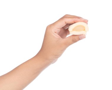 hand holding Banana flavor custard cake isolated on white backgr