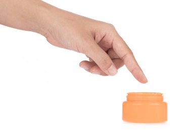 Woman preparing to apply Cream isolated on white background