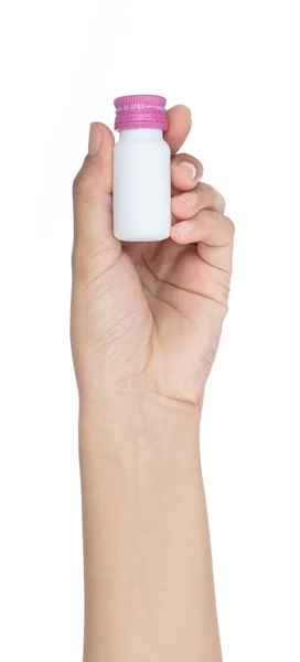 Рука держа медицинскую бутылку изолированы на белом фоне — стоковое фото