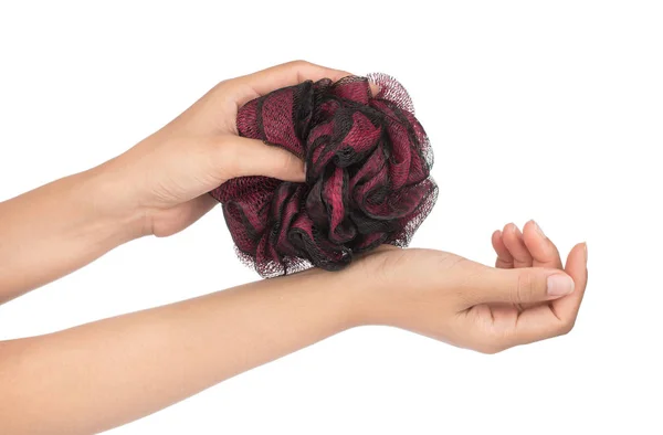 Hand holding  bath puff isolated on white background. — ストック写真