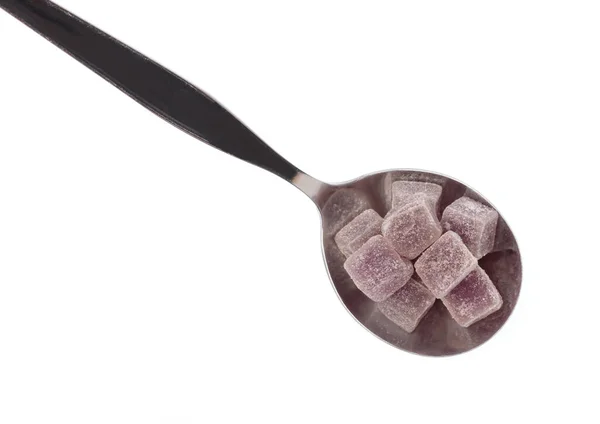 Tasty purple jelly cube on spoon  isolated on a white background — Stock Photo, Image