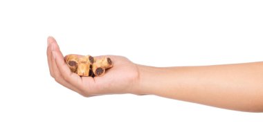 Beyaz arka planda çikolata ile el ele tutuşmalar