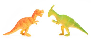 Beyaz arka plan üzerinde izole oyuncak plastik dinozor.
