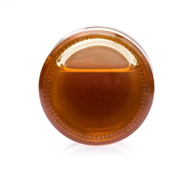 Bal kavanozu beyaz arkaplanda izole