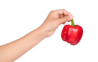 Beyaz arka plan üzerinde izole kırmızı dolmalık biber tutan el
