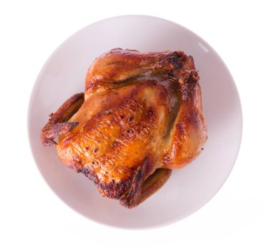 Beyaz arka plan üzerinde izole plaka üzerinde kavrulmuş tavuk