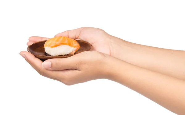 Tangan Memegang Sushi Segar Pada Piring Kayu Terisolasi Pada Latar — Stok Foto