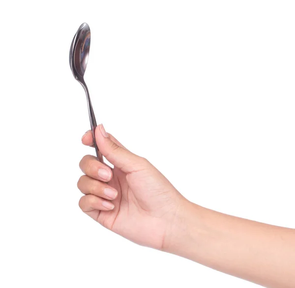 一只勺子 用手握住 与白色背景隔离 — 图库照片