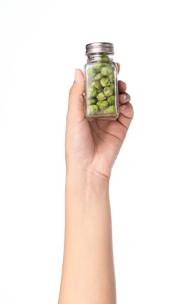 Hand Houden Fles Groene Bonen Snacks Geïsoleerd Witte Achtergrond — Stockfoto