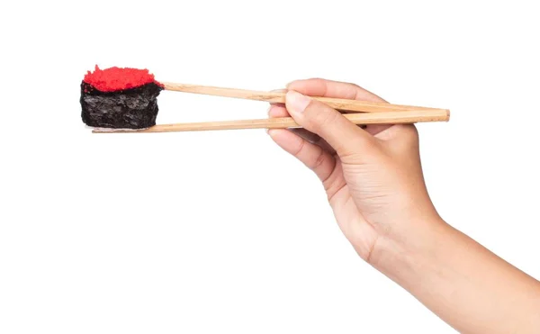 用白色背景隔断的筷子握住寿司 — 图库照片