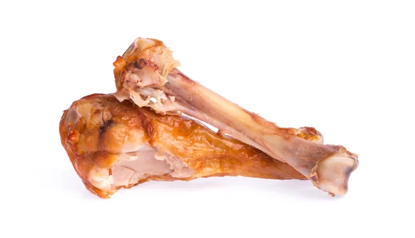 白い背景に隔離されたローストチキンの足の骨 — ストック写真