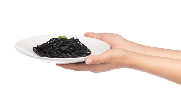 Kéz Gazdaság Fekete Spagetti Edényben Elszigetelt Fehér Alapon — Stock Fotó