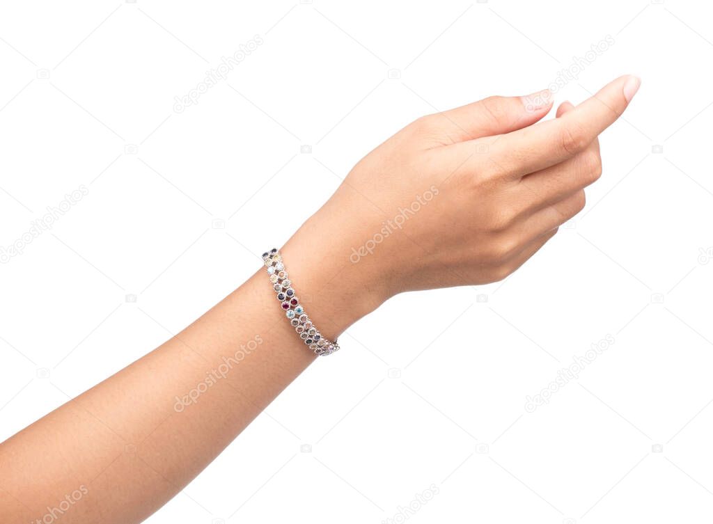 bracelet inlaid with gemstones on hand isolated on white background