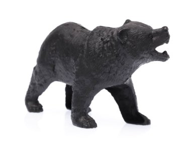 Beyaz arka planda izole edilmiş plastik oyuncak ayı.