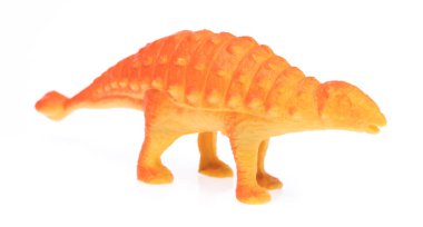 Oyuncak plastik Kentrosaurus beyaz arkaplanda izole edildi.