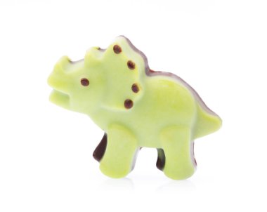 Beyaz arka planda izole edilmiş çikolatalı dinozor..