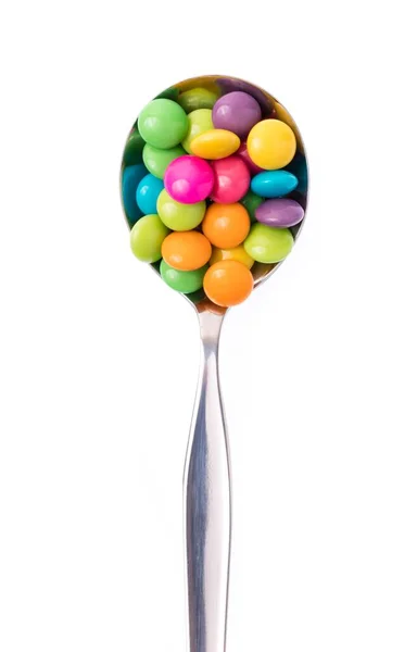 Κουτάλι Χρωματιστά Κουμπιά Καραμέλες Σοκολάτα Απομονώνονται Λευκό Φόντο — Φωτογραφία Αρχείου