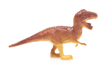 Tyrannosaur Rex made out of plastic. dinosaur toy isolated on white background