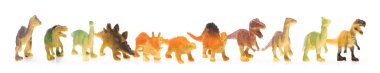 set of plastic dinosaur toy isolated on white background clipart
