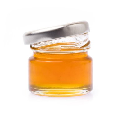 Bal kavanozu beyaz arkaplanda izole