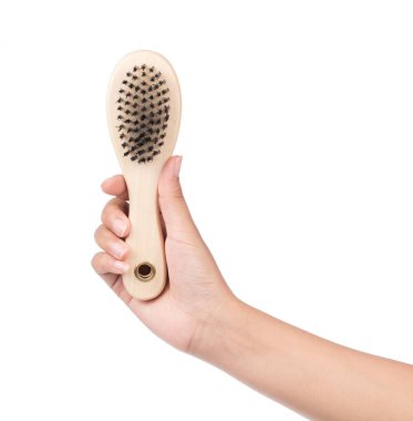 Saçları dökülmüş, beyaz arka planda izole olmuş, yuvarlak saç fırçası.